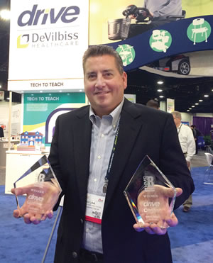 Ed Link holding HME Business New Product Awards