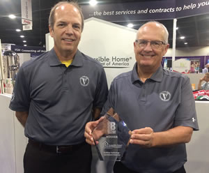 Jim Greatorex and William Stelzer holding HME Business New Product Award